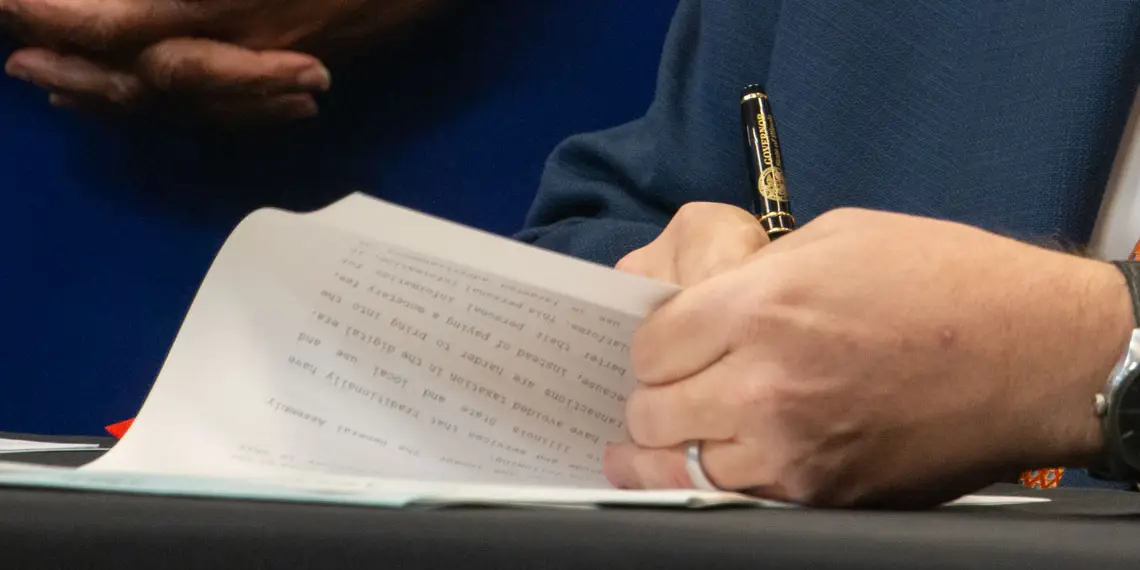 Pritzker signs bills on environmental standards, in-state tuition
